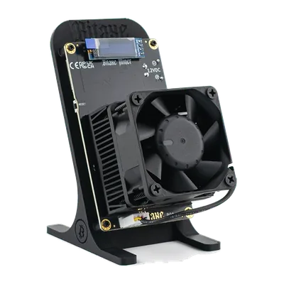 Bitaxe 801 dual chip Bitcoin miner with heatsink and fan on a stand