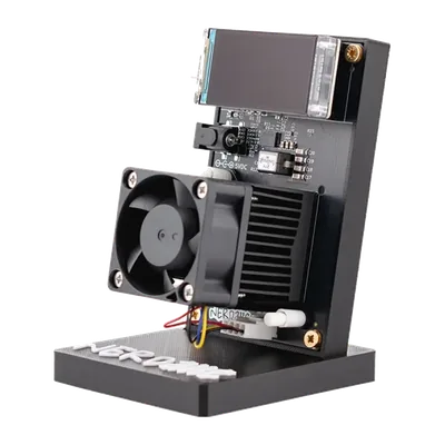 NerdAxe Gamma on its stand: black heatsink, standard fan and 1.9-inch colour display