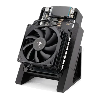 NerdQAxe++ in the Performance Case on its stand, 120 mm fan on the tower cooler, seen from the right